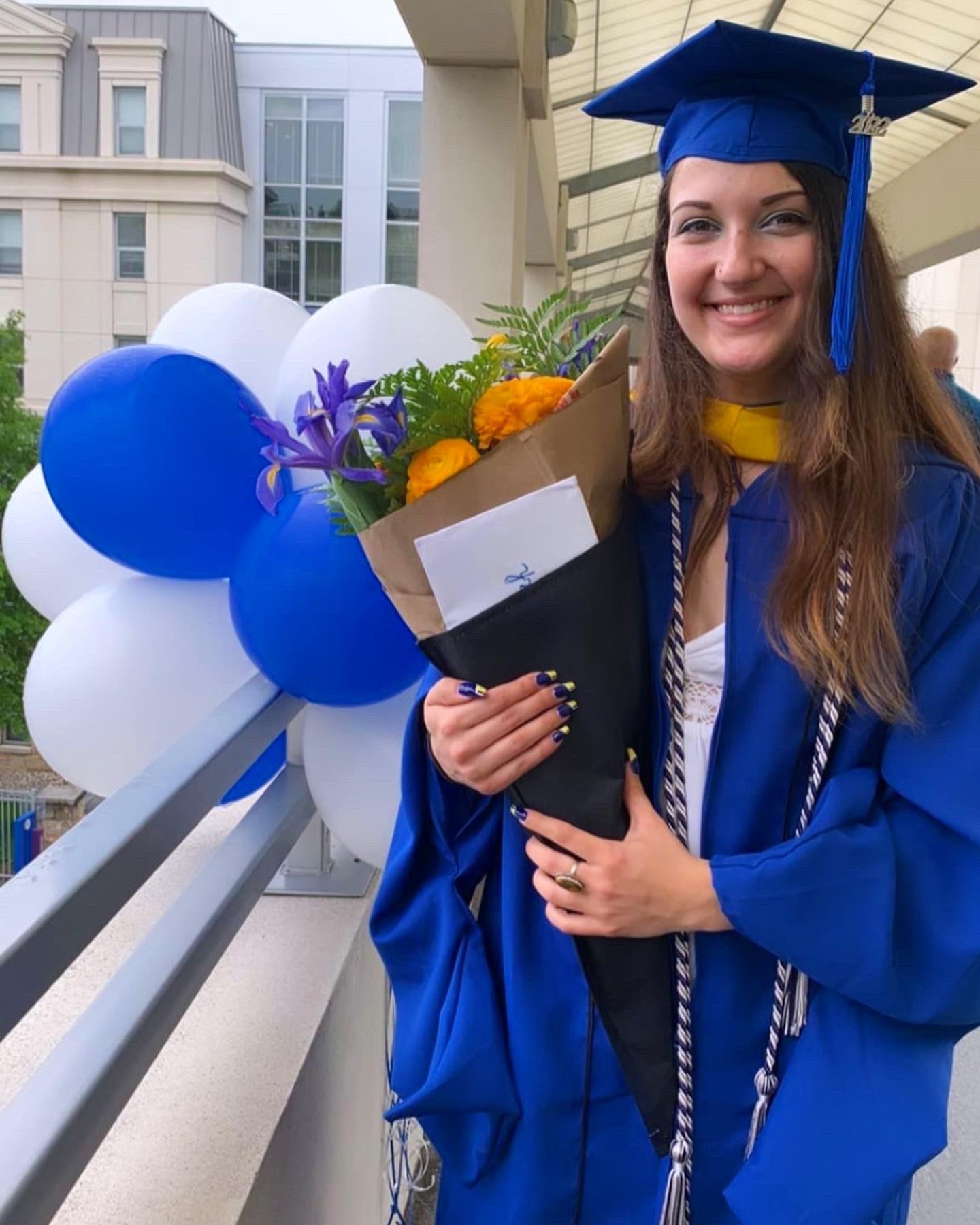 Savannah Frye in graduation cap and gown